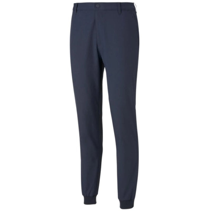 A Front view of the Puma Dealer golfer's Jogging bottoms in a deep navy colour