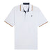 A white golf polo shirt from Puma and the Palm Tree Crew in White glow viewed from the front