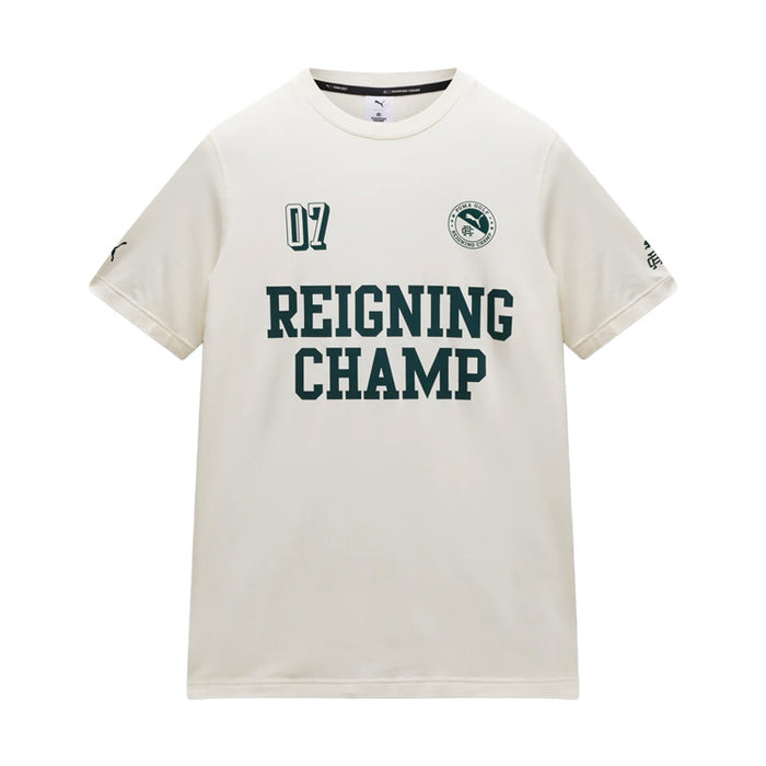 An off-white short-sleeve t-shirt with 'REIGNING CHAMP' printed in dark green across the chest, featuring a '07' on the left chest and a circular crest on the right chest, displayed on a solid white background.