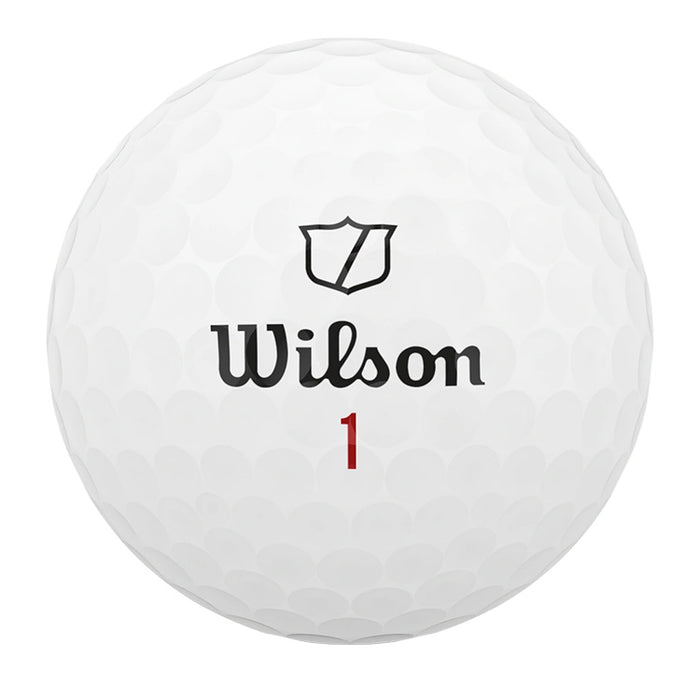 A white dimpled golf ball with the Wilson brand name and shield logo printed in black, and the number 1 in red, centered on a plain white background.